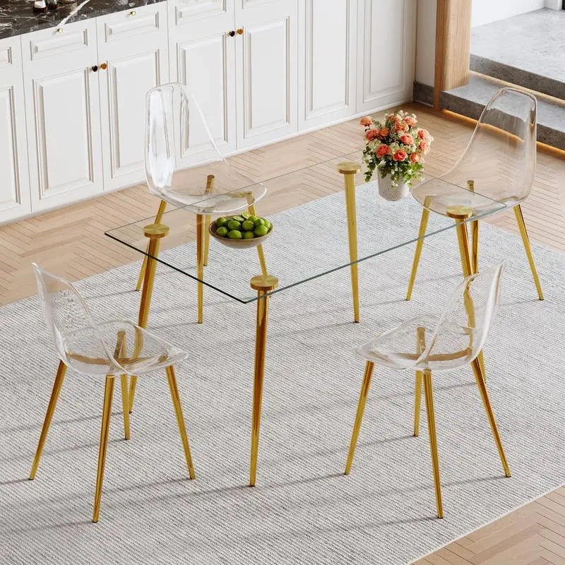 Modern Luxurious Rectangular Glass Dining Table Set with 4 Clear Plastic Chairs and Gold Metal Legs for Comfortable Home